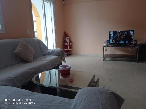 a living room with a couch and a coffee table at La casita de Daniel in Turís