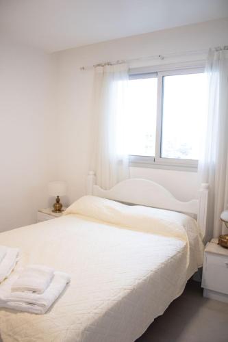 Postel nebo postele na pokoji v ubytování IL Fiume - Exclusivo departamento Premium con Vista al Río