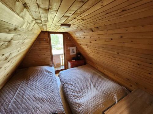 Ένα ή περισσότερα κρεβάτια σε δωμάτιο στο Chalet Zoran