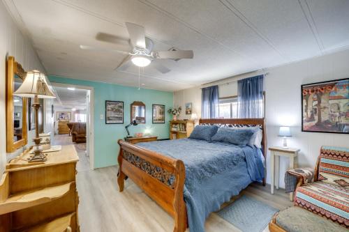 a bedroom with a bed and a living room at Pet-Friendly Camp Verde Home Hiking, Wine and More! in Camp Verde
