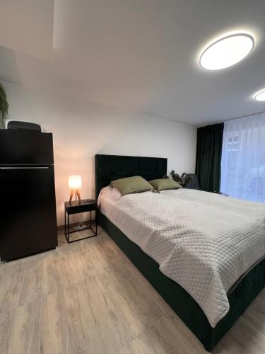 Postel nebo postele na pokoji v ubytování Apartman Liška