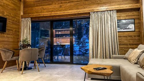 Ruang duduk di Jasna Boutique Chalet