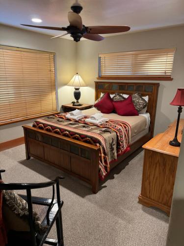 a bedroom with a bed and a ceiling fan at Lake Tahoe Luxury Guest Quarters in South Lake Tahoe