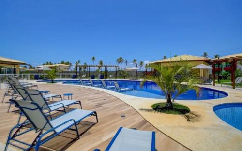 Kolam renang di atau dekat dengan Apartamento na Praia do Baixio, Condomínio Fechado Pé na Areia