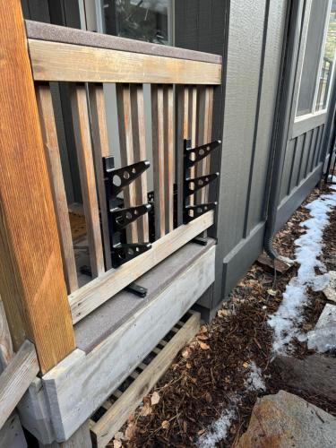 a wooden bench on the side of a house at Lake Tahoe Luxury Guest Quarters in South Lake Tahoe