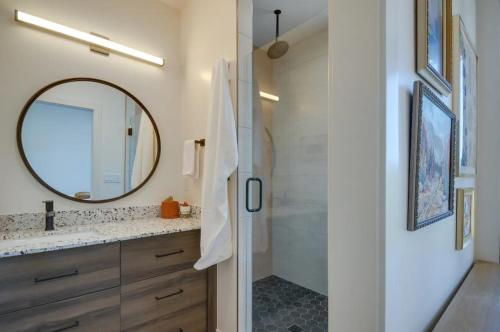 a bathroom with a mirror and a sink at Alpine Mountain Escape in Beaver