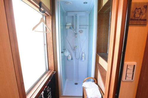 a shower in the hallway of a train at Natural Mind Tour guest house - Vacation STAY 22268v in Sado