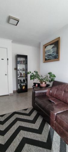 Zona de estar de Departamento Familiar Exclusivo 3D