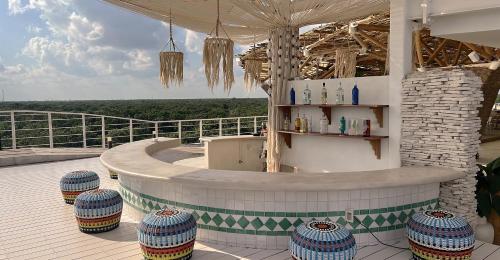 a wellness center on the roof of a building at Siente Tulum in Tulum