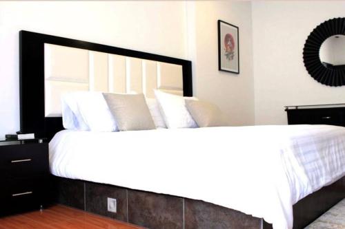 Een bed of bedden in een kamer bij Armonía Casa Spa