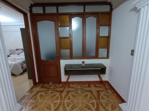 a bathroom with a sink in a room at Como en casa para familia con niños in Sucre