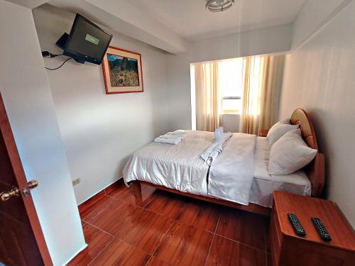 Postel nebo postele na pokoji v ubytování Casa Boutique Machupicchu Cusco