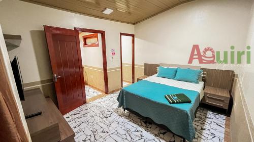 Ένα ή περισσότερα κρεβάτια σε δωμάτιο στο Cómodo departamento en Cobija