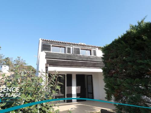 Maison 2 chambres près plage et commerces, quartier calme, parfait pour 5 pers, parking privé. - FR-1-323-366