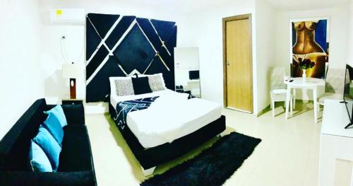 Ένα ή περισσότερα κρεβάτια σε δωμάτιο στο Hotel Platinum Luxury