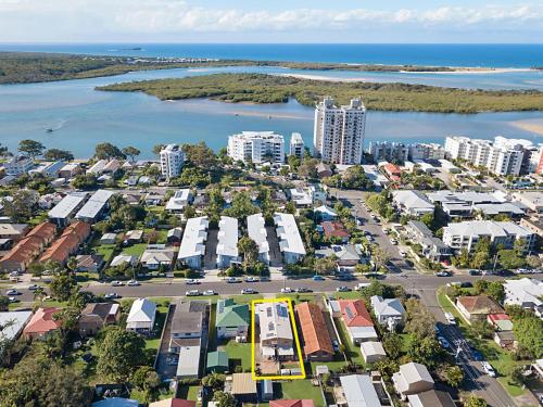 an aerial view of a city next to the water at Popular Central Coastal Apartment in Maroochydore