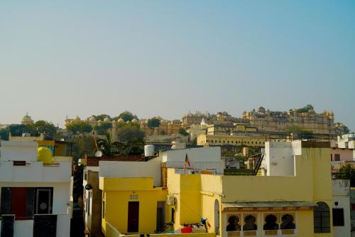 a view of a city with buildings at Shri Daulat Villas in Udaipur