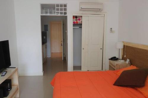 Postel nebo postele na pokoji v ubytování Green Park 116 D Monoambiente 4 pax. frente al lago