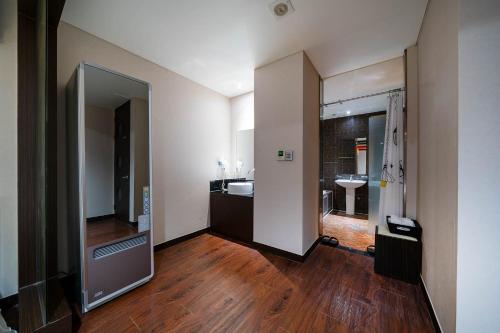 Kuchyň nebo kuchyňský kout v ubytování Dongtan BobosHotel