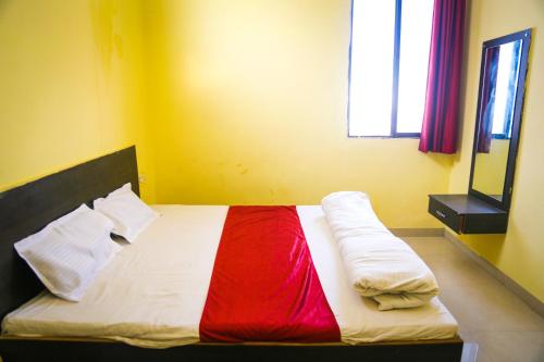 Postel nebo postele na pokoji v ubytování Shubh Parisar