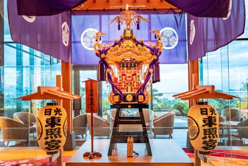 a exhibit of a chinese idol in a room at Da Nang - Mikazuki Japanese Resorts & Spa in Da Nang