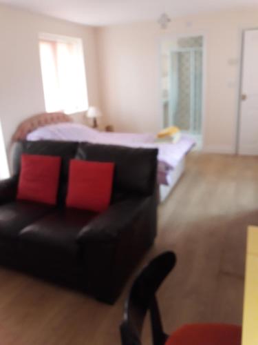 Postel nebo postele na pokoji v ubytování Garden Cottage