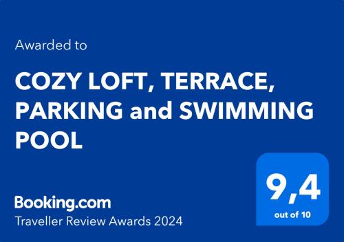 a blue sign with the words cozy left terrace parking and swimming pool at "COZY LOFT", TERRACE, PARKING and SWIMMING POOL in Málaga