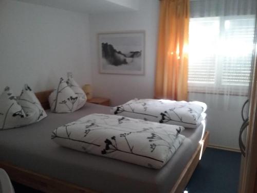 Säng eller sängar i ett rum på Haus Biggi - Ferienwohnung Hochgrat