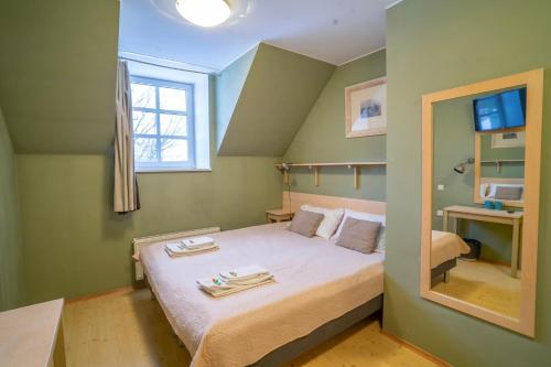Postel nebo postele na pokoji v ubytování Kongo Hotel