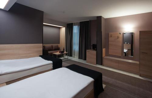 Tempat tidur dalam kamar di Hotel Idol