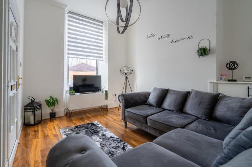 Posezení v ubytování Coatbridge Apartment