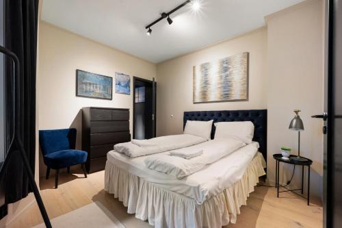 Säng eller sängar i ett rum på Modern 2nd-Floor Luxury Apartement
