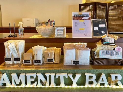 a counter with bags of food on top at Akashi Castle Hotel - Vacation STAY 83574 in Akashi