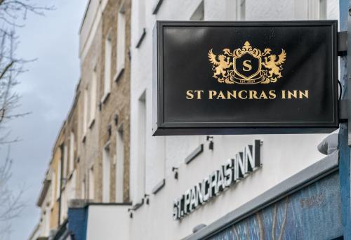 a sign for a st pancras inn on a building at St Pancras Inn in London