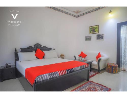 Ένα ή περισσότερα κρεβάτια σε δωμάτιο στο Hotel Kiran Villa Palace, Bharatpur