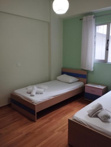 Postel nebo postele na pokoji v ubytování Pegasus Blossom