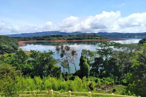 a view of a lake from a hillside at Luxury & Peaceful Lake Dream Villa With Pool1 in Tronadora