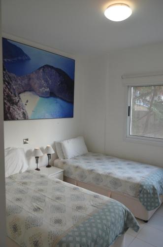 Llit o llits en una habitació de Mia's Cove