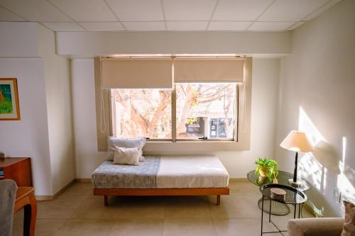 En eller flere senge i et værelse på Edificio Olascoaga Centro 2