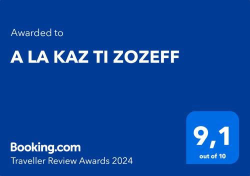 un rectangle bleu avec les mots a la kaztec zeref dans l'établissement A LA KAZ TI ZOZEFF, à Saint-Joseph