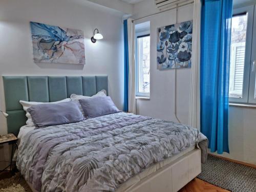 Ένα ή περισσότερα κρεβάτια σε δωμάτιο στο Heart of Omis - Blue