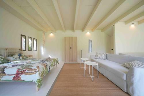 Un pat sau paturi într-o cameră la Casa Mas Casellas