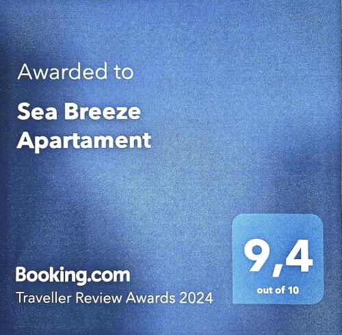 ein Zeichen, das auf das Meer aufgeteilt ist in der Unterkunft Sea Breeze Apartament in Benicarló