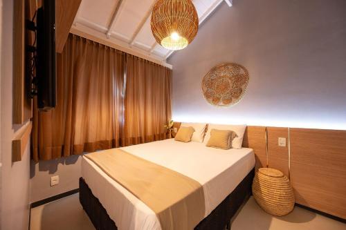 מיטה או מיטות בחדר ב-Lindo Quarto & Sala + SofaCama