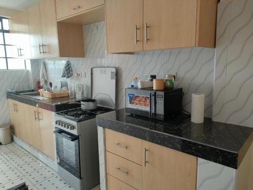 A kitchen or kitchenette at Crislyn homes