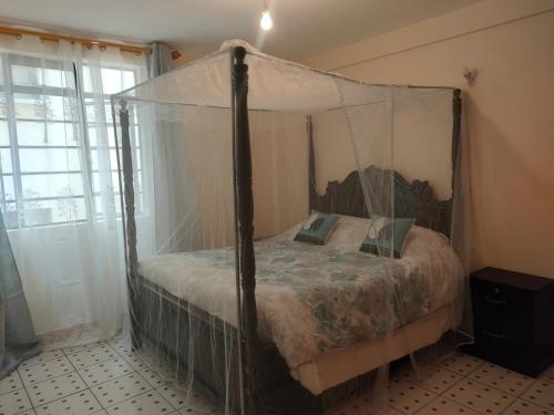 Posteľ alebo postele v izbe v ubytovaní Crislyn homes