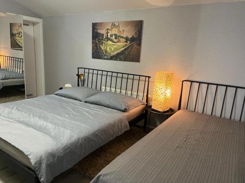 Katil atau katil-katil dalam bilik di Apartments RENESANCE