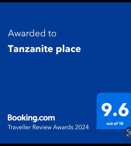 a blue screen with the text awarded to tamarite place at Tanzanite place in Tangalle