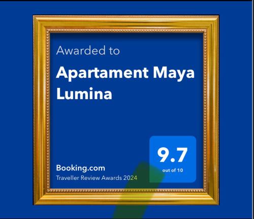 a picture frame with the text awarded to apartment maya luna at Apartament Maya Lumina in Lumina