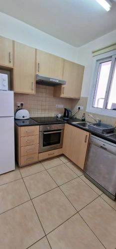 Una cocina o cocineta en Amigos Apartment Mythical